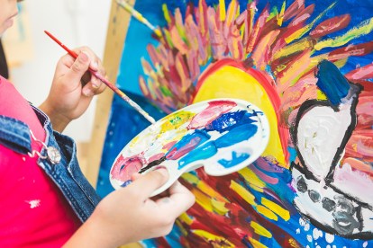 Child Painting - Success in Early Education Requires Innovation