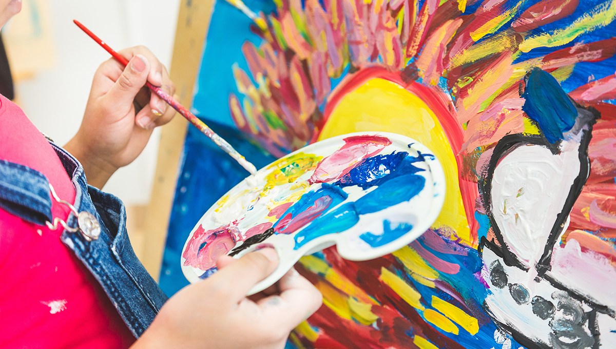 Child Painting - Success in Early Education Requires Innovation