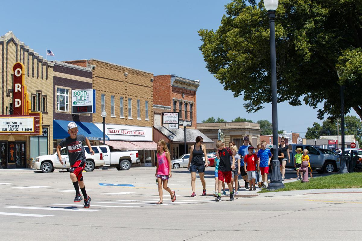 Students walk across the street in rural America