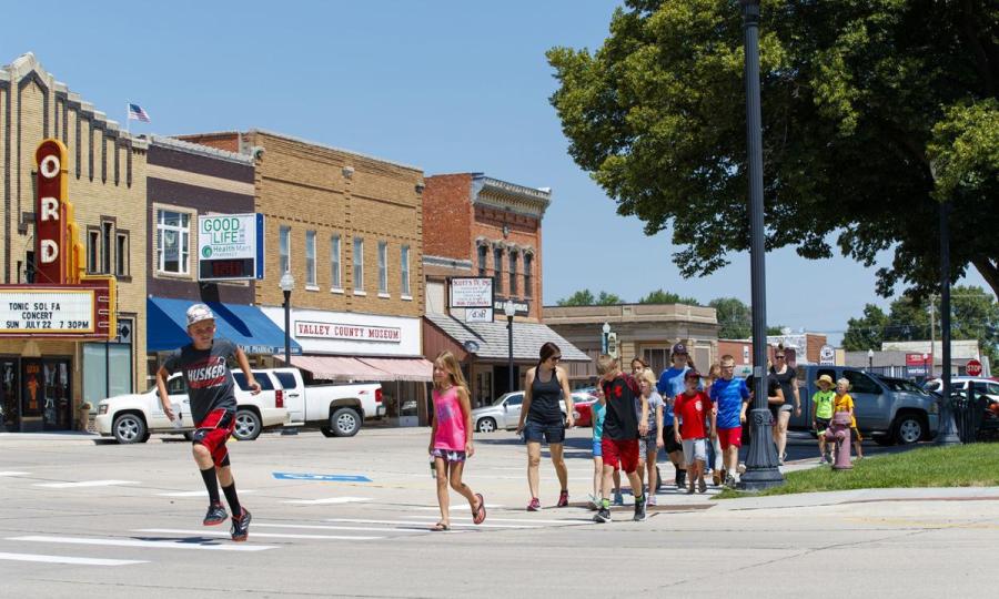 Students walk across the street in rural America