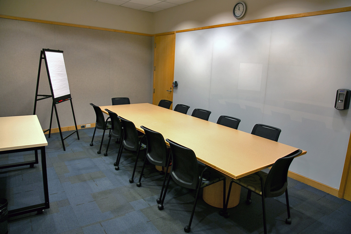 A smaller conference room with one table seating 12.