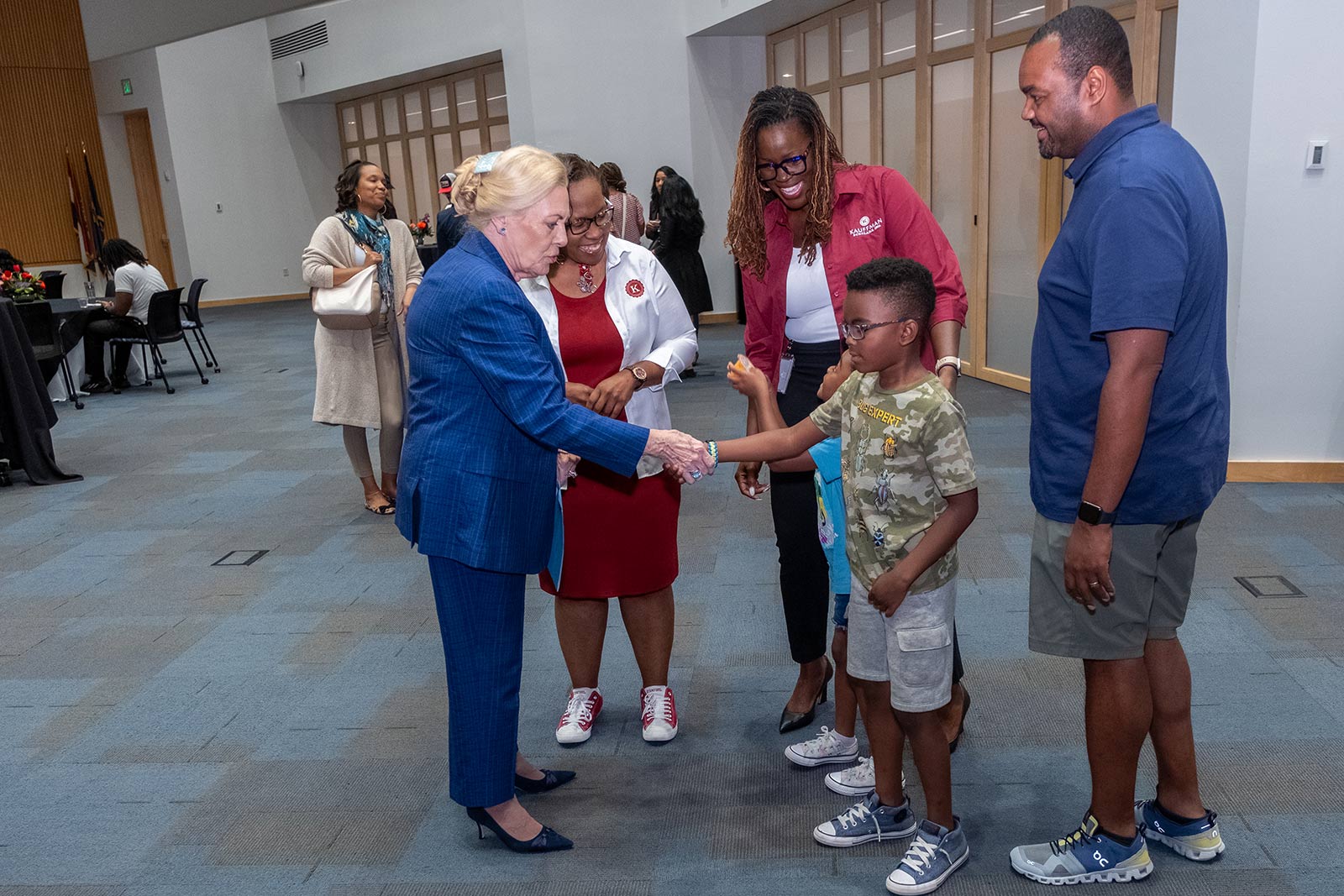 Julia Irene Kauffman and Dr. DeAngela Burns-Wallace meet Tanesha Ford's family.