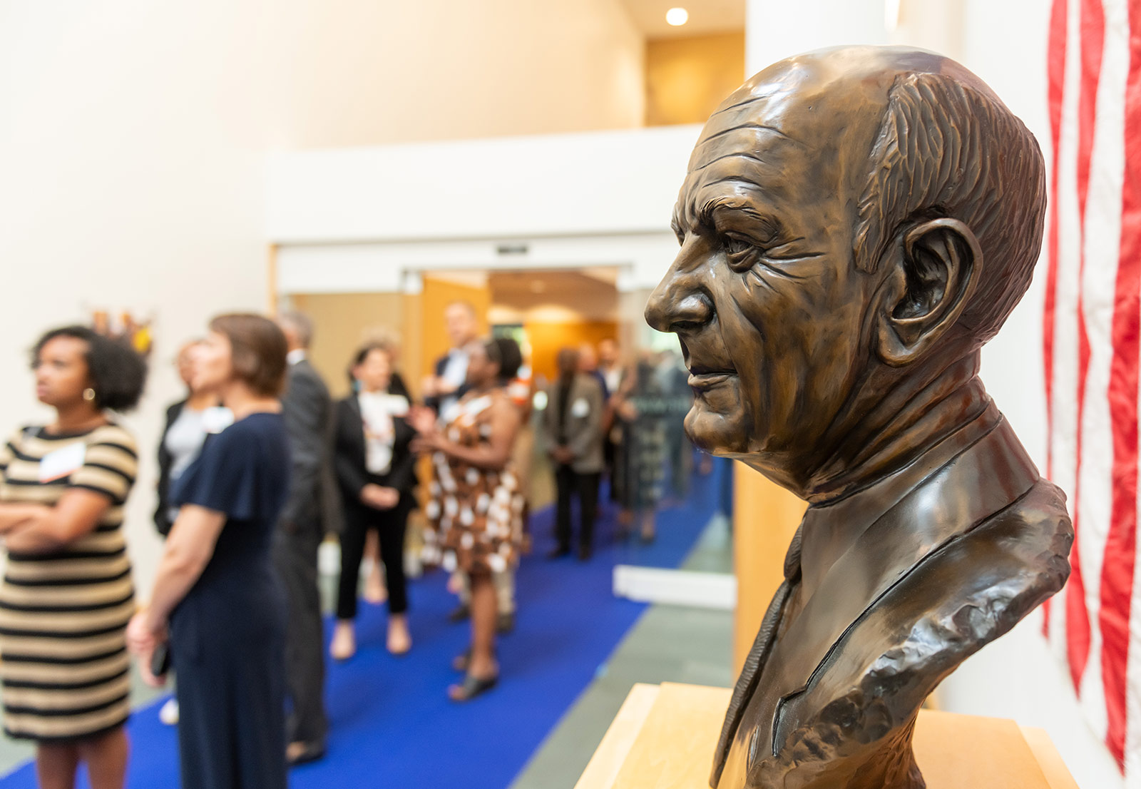 A side profile of the portrait bust of Ewing Marion Kauffman inside of the Kauffman Foundation