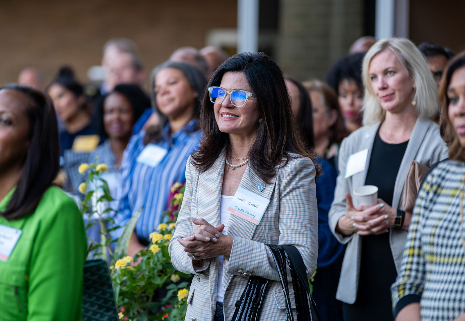 Community members listening to Dr. DeAngela Burns-Wallace's remarks at the Kauffman Foundation Open House event Sept. 28, 2023.