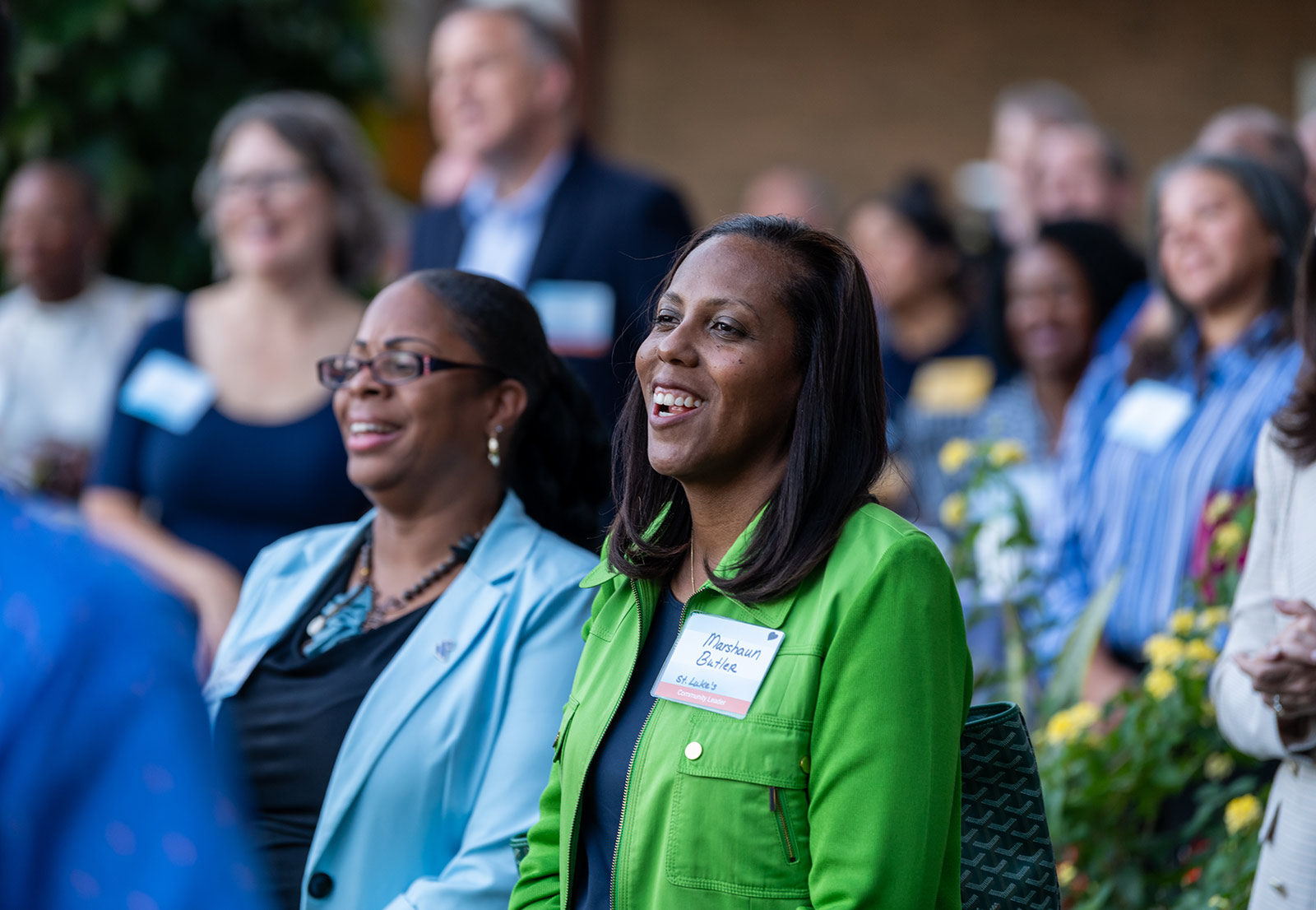 Community members listening to Dr. DeAngela Burns-Wallace's remarks at the Kauffman Foundation Open House event Sept. 28, 2023.