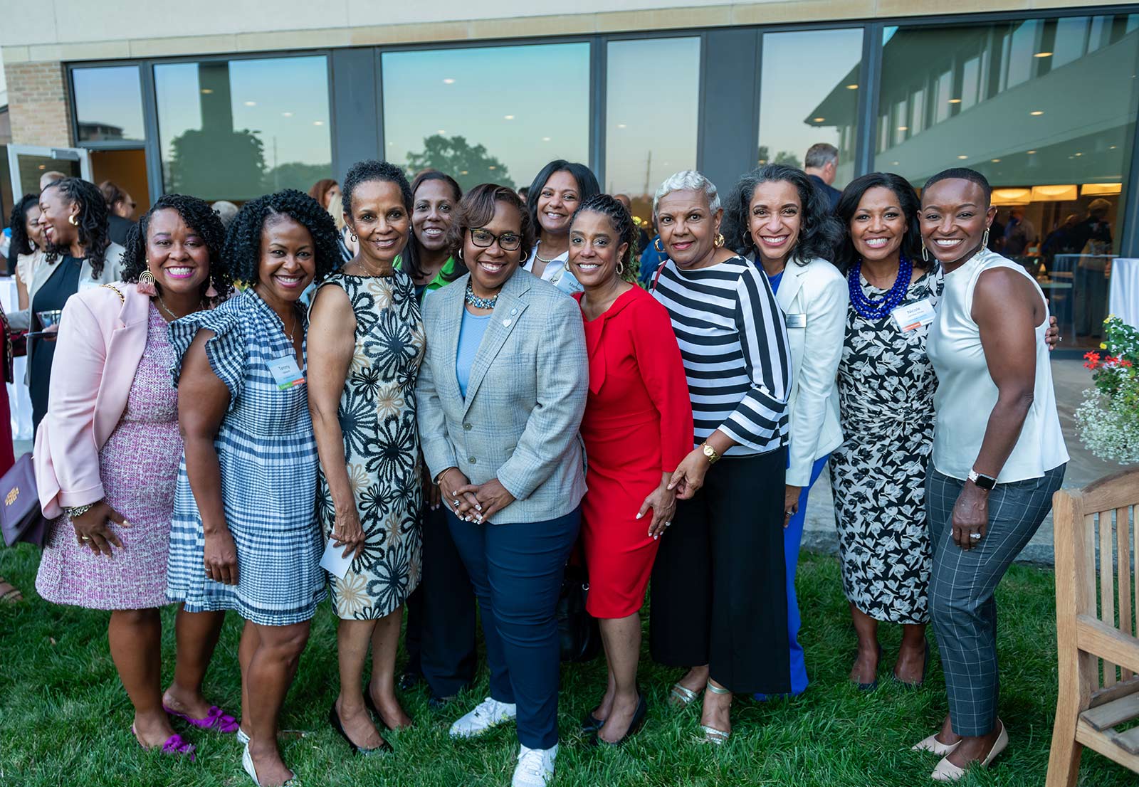 Community members pose with Dr. DeAngela Burns-Wallace at the Kauffman Foundation Open House event Sept. 28, 2023.