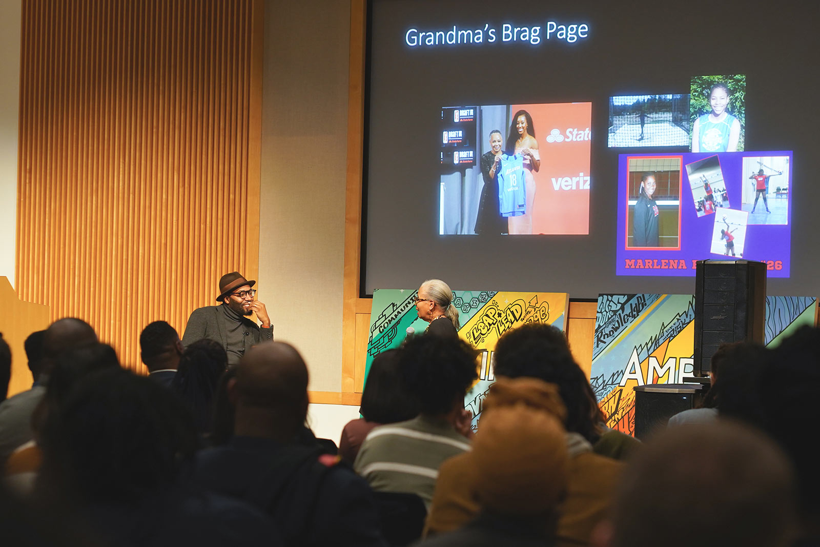 Dr. Chistopher Emdin and Gloria Ladson-Billings sit at the front of a full room of 2020 Amplify attendees