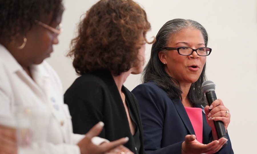 Dr. Yvonne Owens Ferguson, chief research, learning, and evaluation officer, speaks during a Community Conversation hosted by the Ewing Marion Kauffman Foundation. To her left is Allison Greenwood Bajracharya, chief impact and strategy officer, and Dr. DeAngela Burns-Wallace, president and chief executive officer.