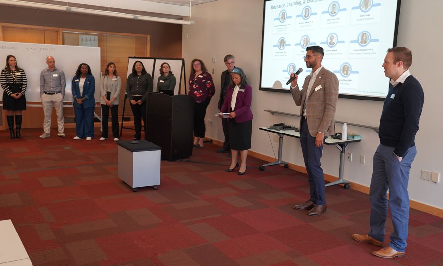 The Kauffman Foundation's Research, Learning, and Evaluation team introduces themselves to attendees at the inaugural Economic Mobility, Research, and Data Forum in November 2024.