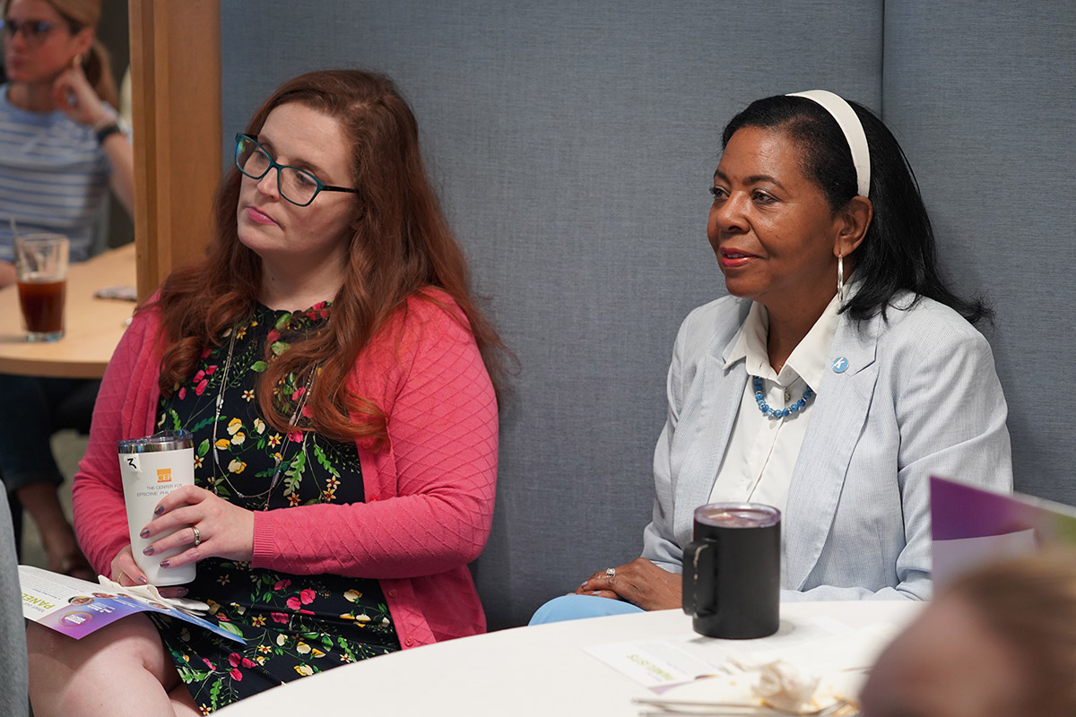 Attendees gather for the Women's History Month fireside chat at the Ewing Marion Kauffman Foundation Conference Center.